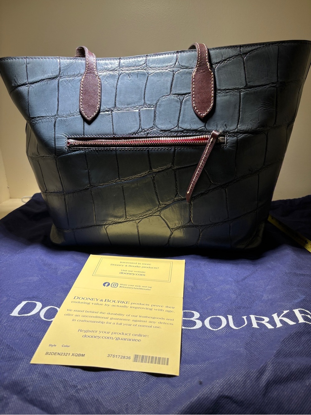 Dooney & Bourke Steele Blue leather croc embossed tote.